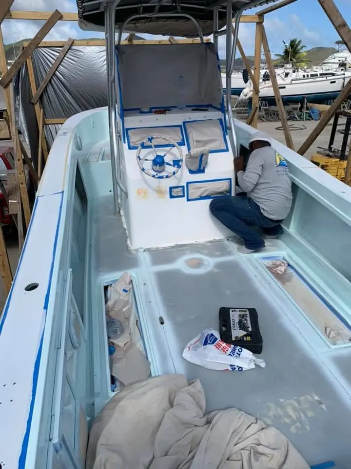 Masked cockpit prepared for fiberglass repair and repaint by SXM Refinishing in St. Maarten